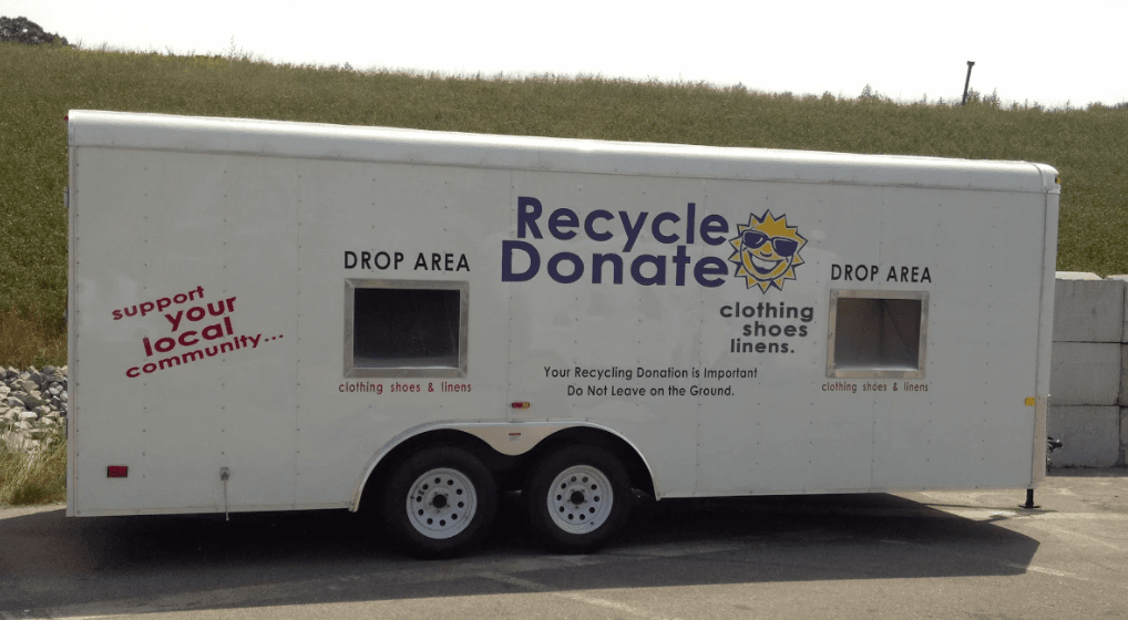 Large white trailer labeled recycling